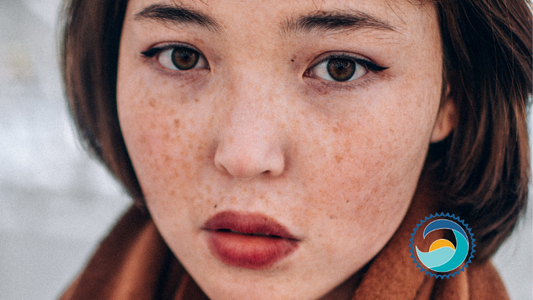 Close up of person's face, which should be protected by broad-spectrum sunscreen