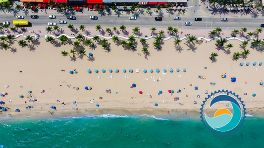 Drone shot of action on a crowded Florida beach, Crowds of people unaware of their actions impact on the beach and in the ocean,