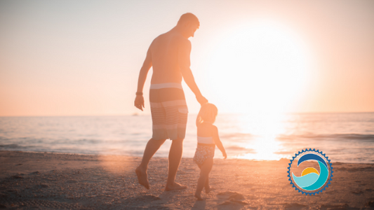 Father and Son Wear Safe Sunscreen on the Beach