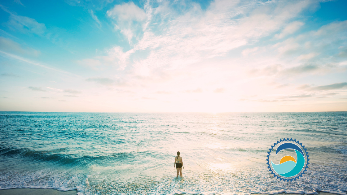 Beachgoer Contemplating New Year's Resolutions While Wading in the Ocean, Beachgoer Contemplating New Year's Resolutions While Wading in the Ocean
