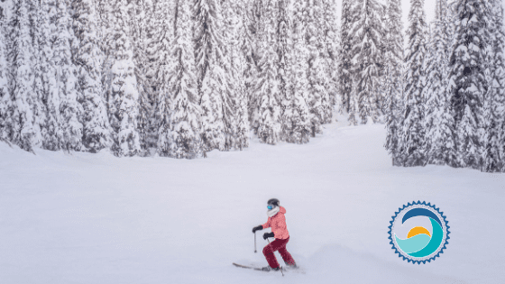 Skiier In The Winter Sun, Still Uses Sunscreen