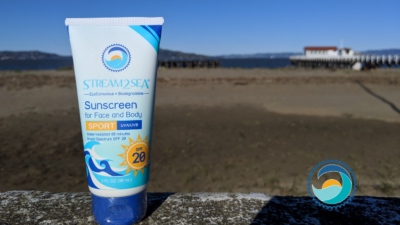 Bottle of Stream2Sea SPF 20 Sunscreen at the Beach Disproving Myths