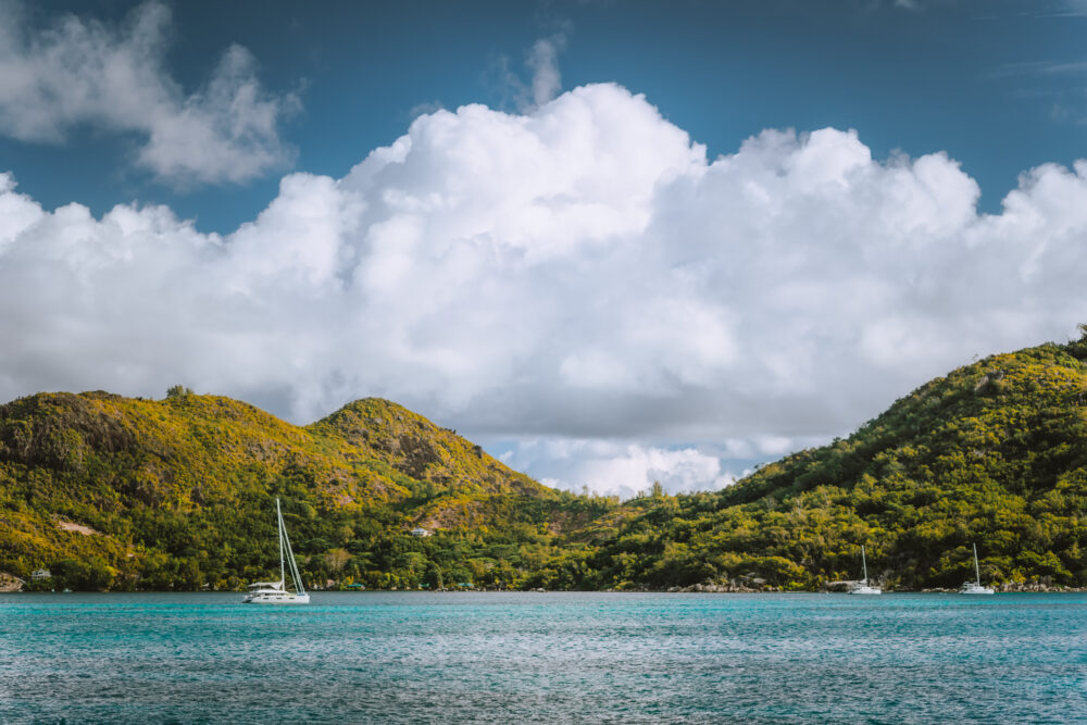 Yacht boats near an uninhabitable island near Victoria city, Mahe, Seychelles